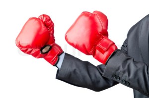 Businessman with boxing gloves